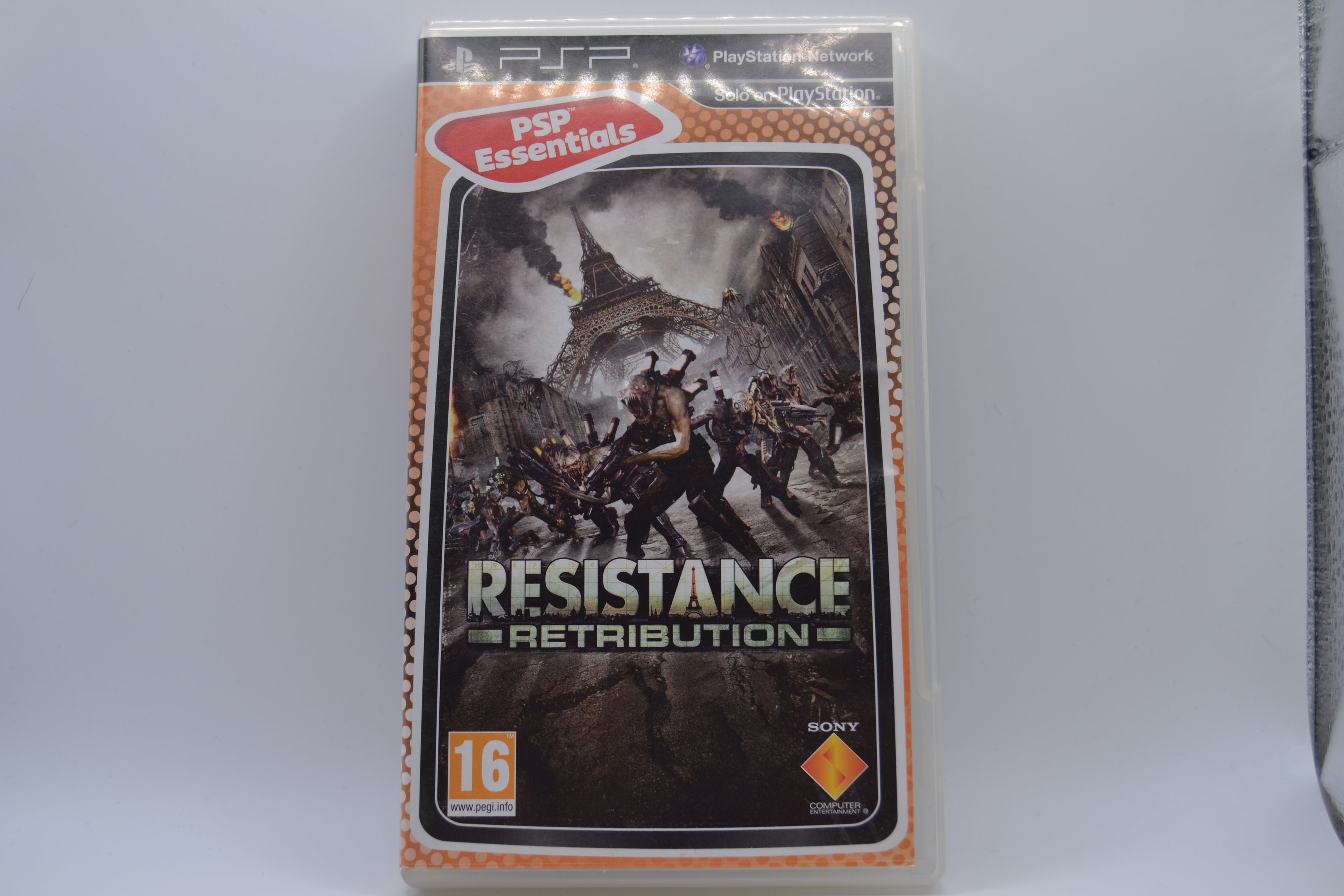 Resistance Retribution Essentials PlayStation Portable juego + caja PAL ESP - Estado básico