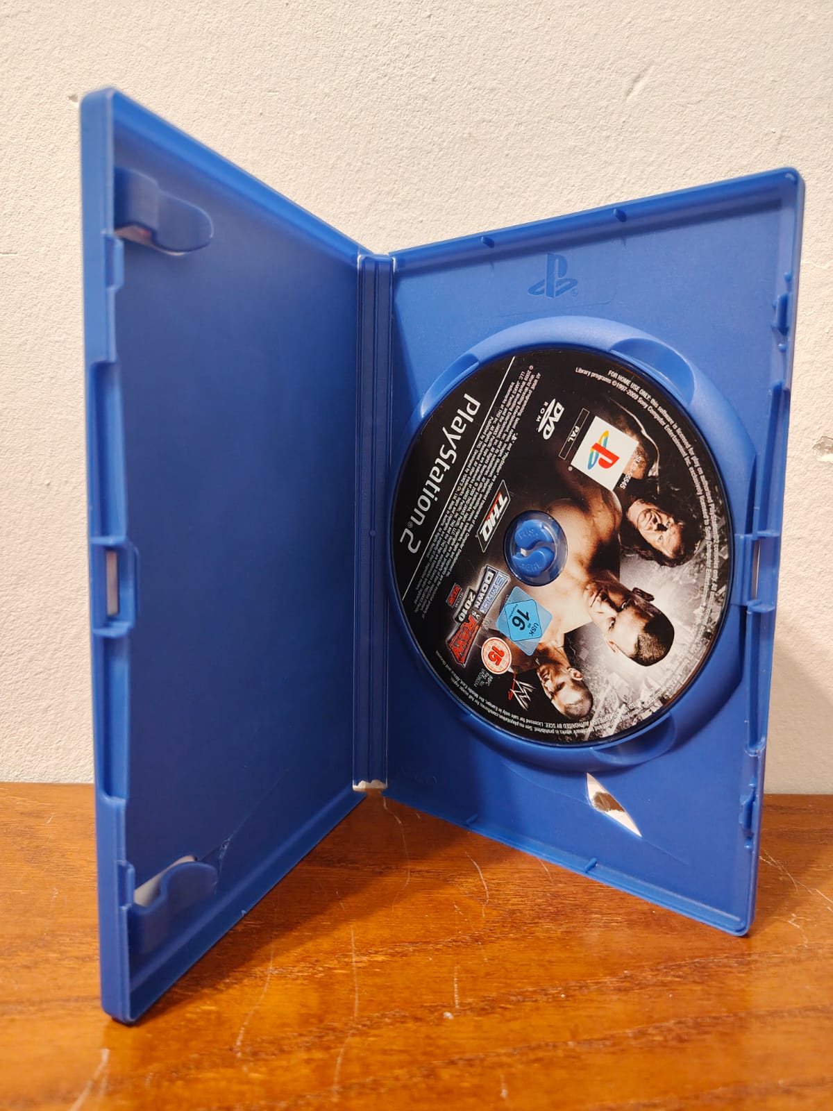 SmackDown vs Raw 2010 PlayStation 2 completo PAL ESP - Estado básico
